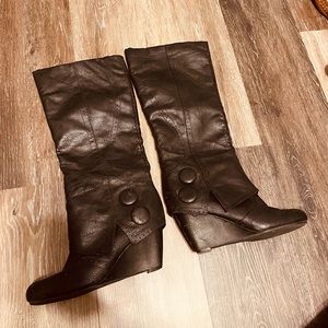 Black tall wedge heeled boots